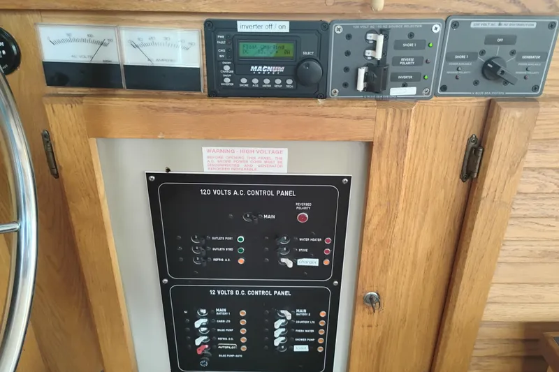 Slide: The Image of Electrical control panel on a 1985 Mainship 34 Mk III boat. - 17