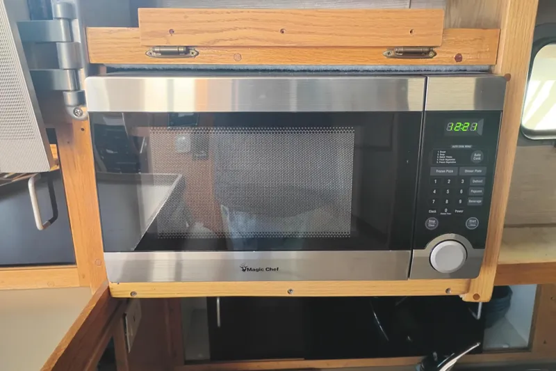 Slide: The Image of Magic Chef microwave in a 1985 Mainship 34 Mk III boat kitchen. - 19