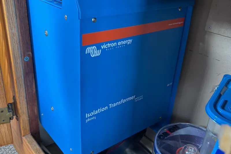 Slide: The Image of Victron Energy isolation transformer on 1985 Mainship 34 III boat, enhancing electrical safety. - 49