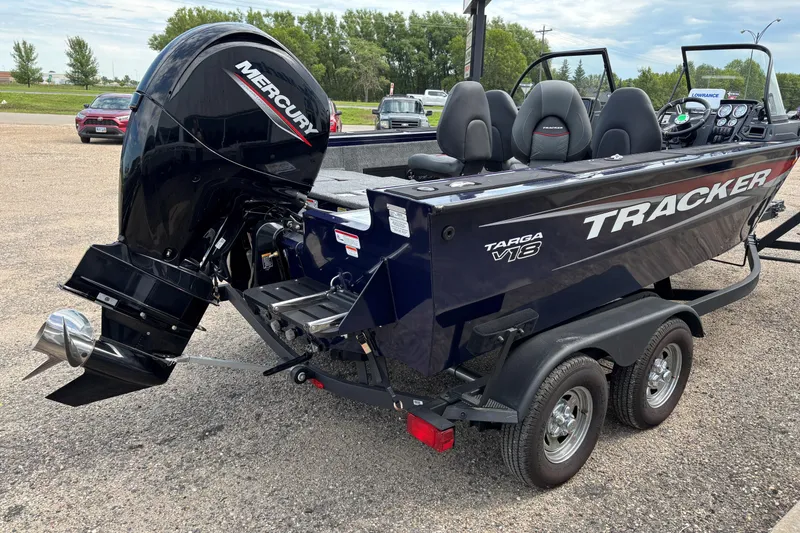 Slide: The Image of 2025 Tracker Targa V-18 Combo boat with Mercury outboard engine on trailer. - 14