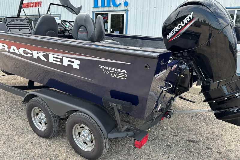 Slide: The Image of 2025 Tracker Targa V-18 Combo boat with Mercury engine on trailer. - 15