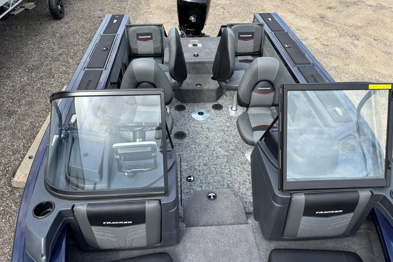Slide: The Image of 2025 Tracker Targa V-18 Combo boat interior with seating and windshield, viewed from above. - 4