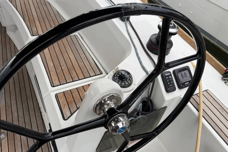 Slide: The Image of Steering wheel and controls of 2016 Jeanneau Sun Odyssey 349 sailboat. - 27