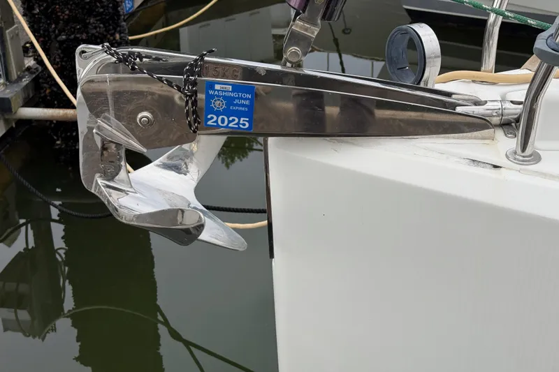 Slide: The Image of Anchor of 2016 Jeanneau Sun Odyssey 349 with Washington registration sticker, expiring June 2025. - 32