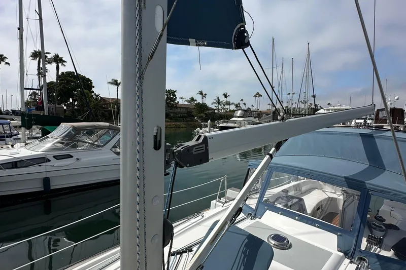 Slide: The Image of Sailboat Hunter 36, 2008 model, docked in a marina with clear skies. - 20