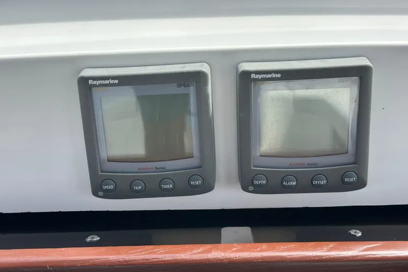Slide: The Image of Raymarine speed and depth displays on 2008 Hunter 36 yacht dashboard. - 42