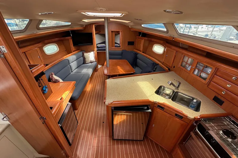 Slide: The Image of Interior of 2008 Hunter 36 sailboat with wood finish and modern amenities. - 44