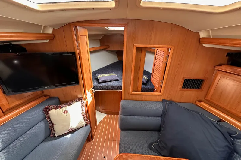 Slide: The Image of Interior of 2008 Hunter 36 sailboat with cozy seating and cabin view. - 75