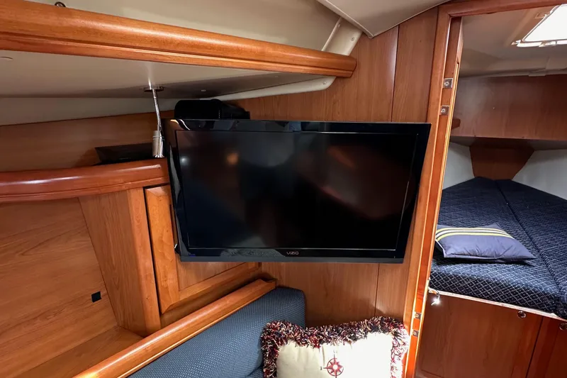 Slide: The Image of Interior of 2008 Hunter 36 yacht with mounted TV and cozy cabin. - 76