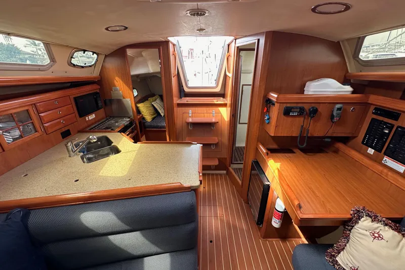 Slide: The Image of Interior of a 2008 Hunter 36 sailboat with wood finish and modern amenities. - 83