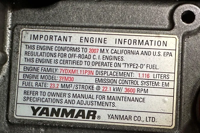 Slide: The Image of Yanmar engine information plate for 2008 Hunter 36, detailing specifications and compliance. - 85