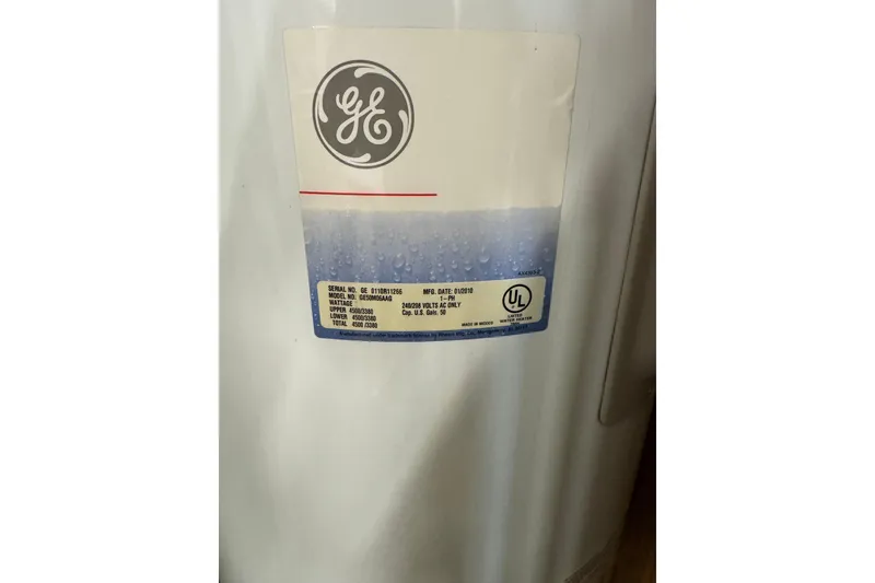 Slide: The Image of Label on a GE appliance with serial and model numbers, UL certification. - 25