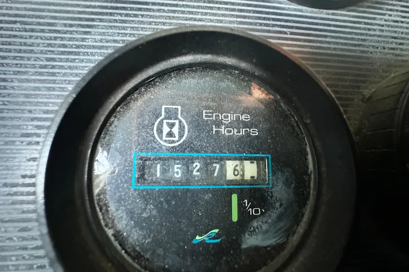 Slide: The Image of Engine hour meter showing 1527.6 hours on 1990 Sea Ray 380 Aft Cabin. - 23