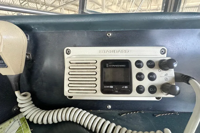 Slide: The Image of Radio control panel on a 1990 Sea Ray 380 Aft Cabin boat. - 25