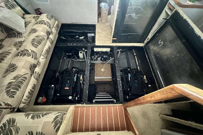 Slide: The Image of Engine room of a 1990 Sea Ray 380 Aft Cabin yacht, showcasing dual engines. - 60