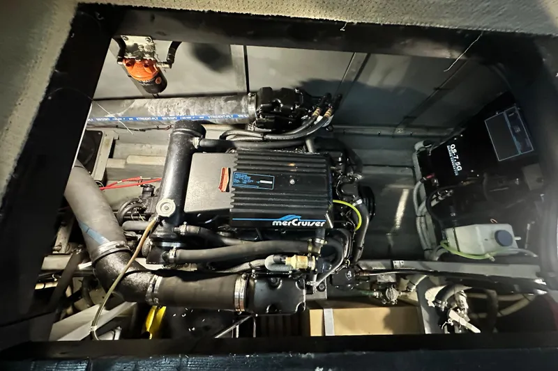 Slide: The Image of Engine compartment of 1990 Sea Ray 380 Aft Cabin with MerCruiser engine. - 62