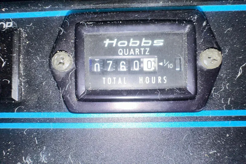 Slide: The Image of Hobbs meter showing 7600 total hours on 1990 Sea Ray 380 Aft Cabin. - 70