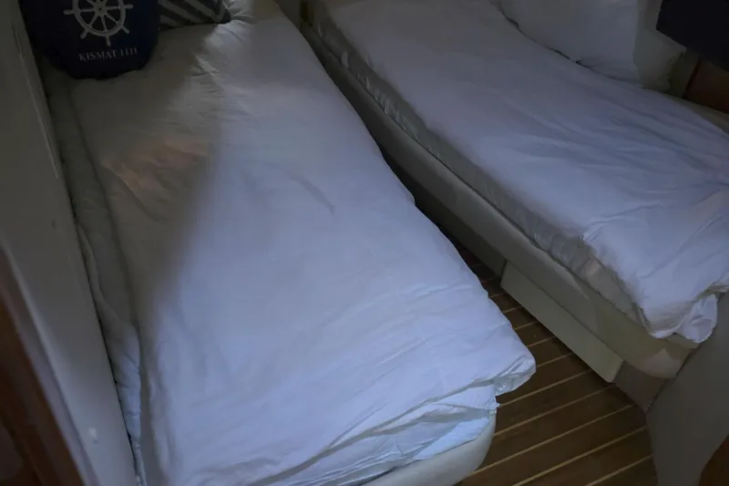 Slide: The Image of Interior of 2001 Sunseeker Camargue 44 yacht, showing wooden flooring and shower area. - 13