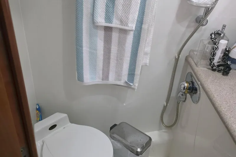 Slide: The Image of Bathroom interior of 2001 Sunseeker Camargue 44 yacht with shower and towel. - 15