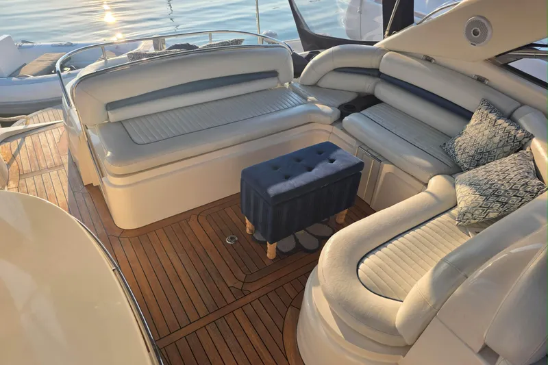 Slide: The Image of Luxurious interior of 2001 Sunseeker Camargue 44 yacht with elegant seating and cushions. - 3