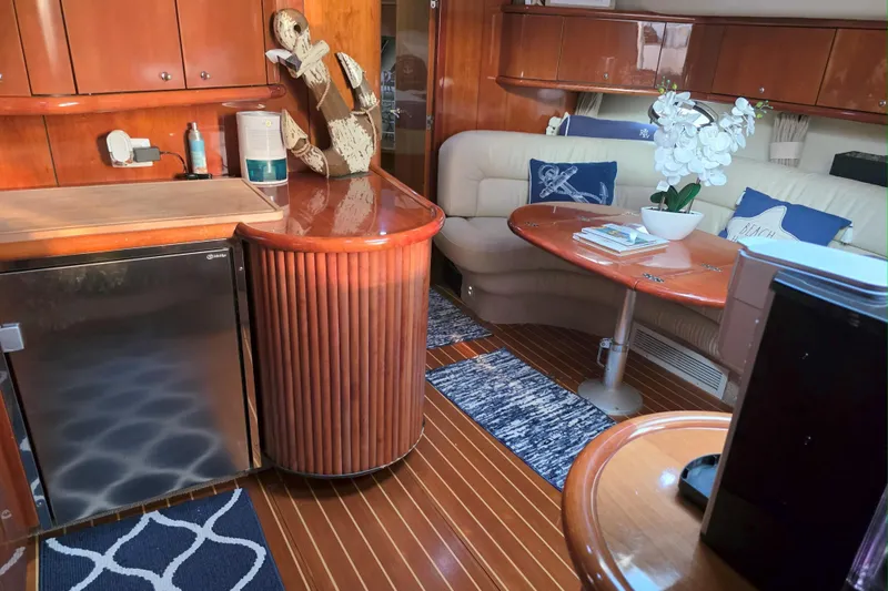 Slide: The Image of Luxurious interior of 2001 Sunseeker Camargue 44 yacht with elegant wood finishes. - 8