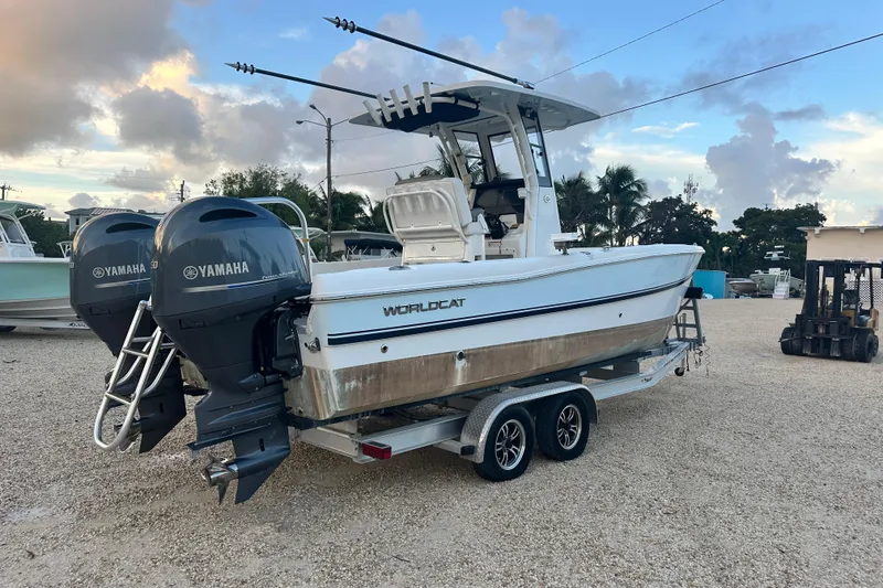 Slide: The Image of 2022 World Cat 235 CC boat with dual Yamaha engines on a trailer. - 3