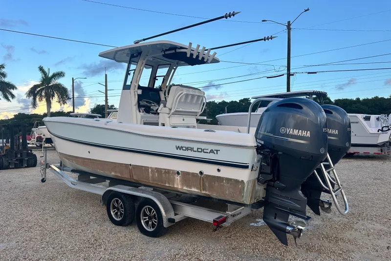 Slide: The Image of 2022 World Cat 235 CC boat with twin Yamaha engines on a trailer. - 5