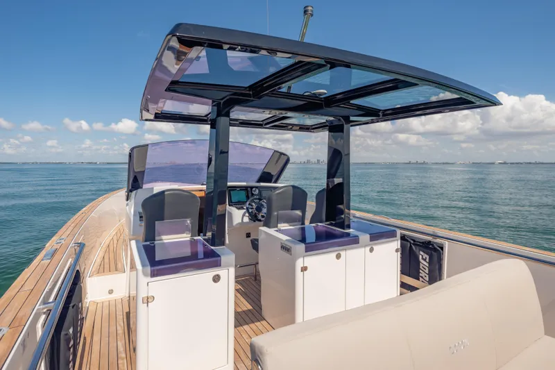 Slide: The Image of 2021 Fjord 40 Open yacht with sleek design, spacious deck, and modern amenities on open water. - 11