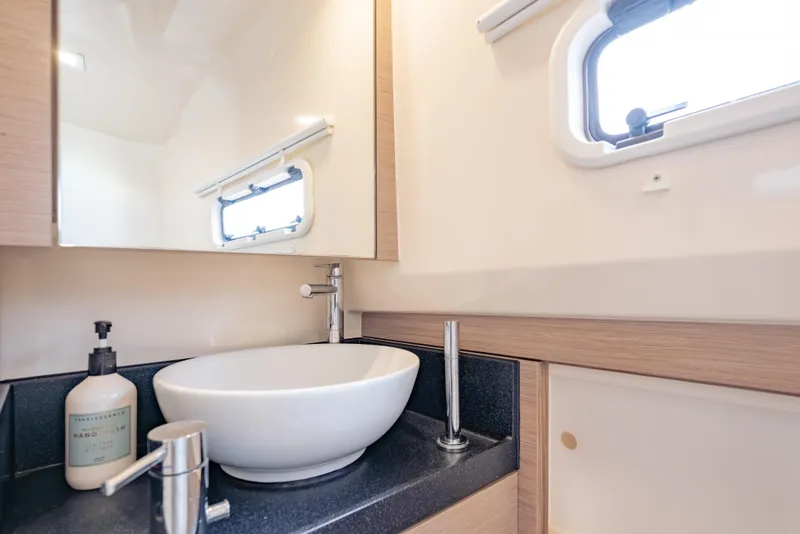 Slide: The Image of Modern bathroom interior of 2021 Fjord 40 Open yacht with sleek sink and window. - 19