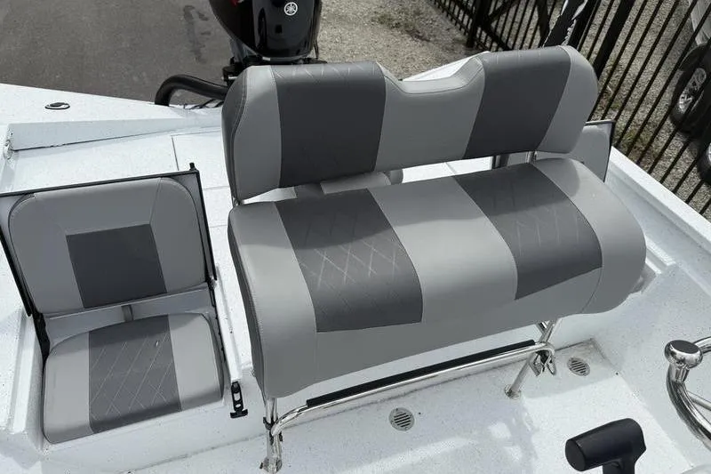 Slide: The Image of 2026 Xpress H22B boat seats with gray and black upholstery, showcasing modern design. - 15