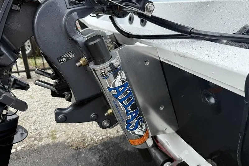 Slide: The Image of Close-up of Atlas hydraulic jack plate on 2026 Xpress H22B boat. - 18