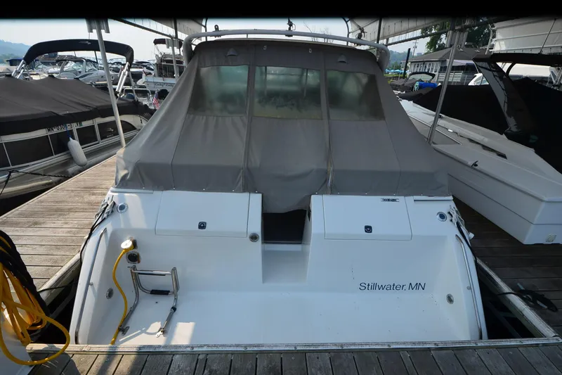 Slide: The Image of 1990 Slick Craft 310 SC boat docked in Stillwater, MN marina. - 2