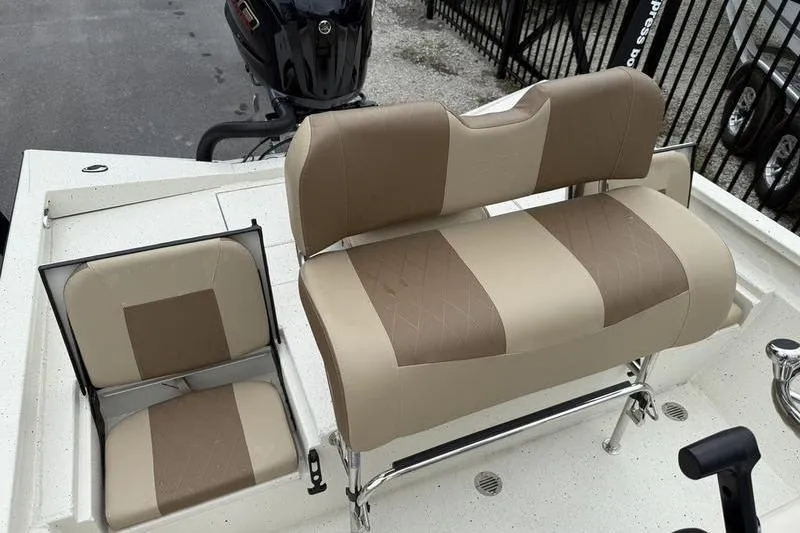 Slide: The Image of 2026 Xpress H22B boat seats with beige and brown upholstery, featuring a sleek design. - 16