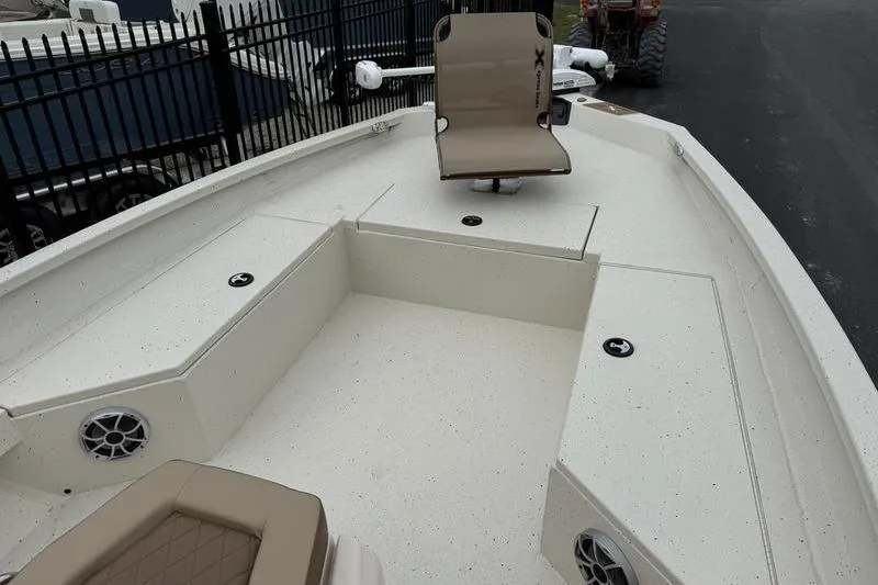 Slide: The Image of 2026 Xpress H22B boat interior with seating and storage compartments. - 7