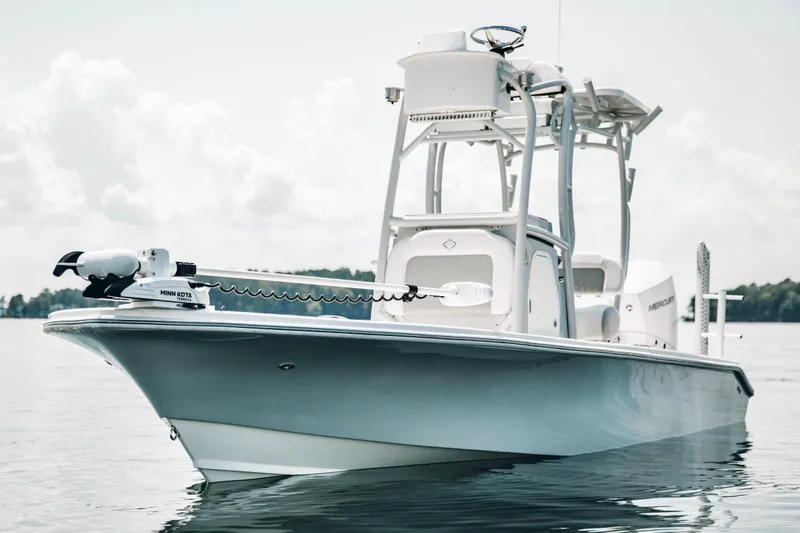 Slide: The Image of 2021 Xplor x24 Andros boat on calm water, featuring sleek design and modern equipment. - 10