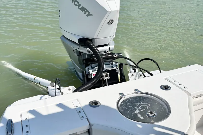 Slide: The Image of Outboard motor on 2021 Xplor x24 Andros boat in water. - 17