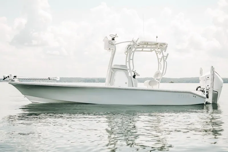 Slide: The Image of 2021 Xplor x24 Andros boat on calm water under cloudy sky. - 4