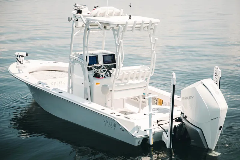 Slide: The Image of 2021 Xplor x24 Andros boat with Mercury engine on calm water. - 8