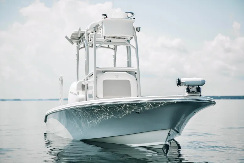 Slide: The Image of 2021 Xplor x24 Andros boat on calm water under a cloudy sky. - 9