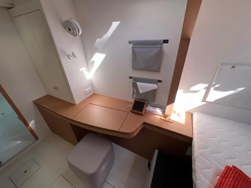 Slide: The Image of Modern cabin interior of 2022 Excess XCS 11 yacht with desk and bed. - 4