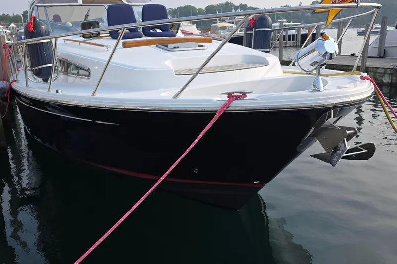 Slide: The Image of 2005 Chris-Craft Roamer 40 yacht docked at marina, featuring sleek design and polished finish. - 10