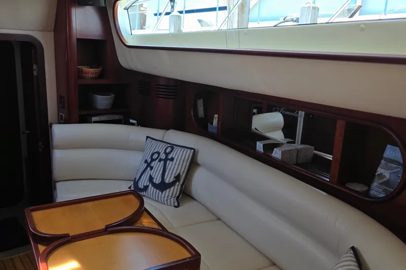 Slide: The Image of Luxurious interior of 2005 Chris-Craft Roamer 40 yacht with elegant seating and nautical decor. - 56