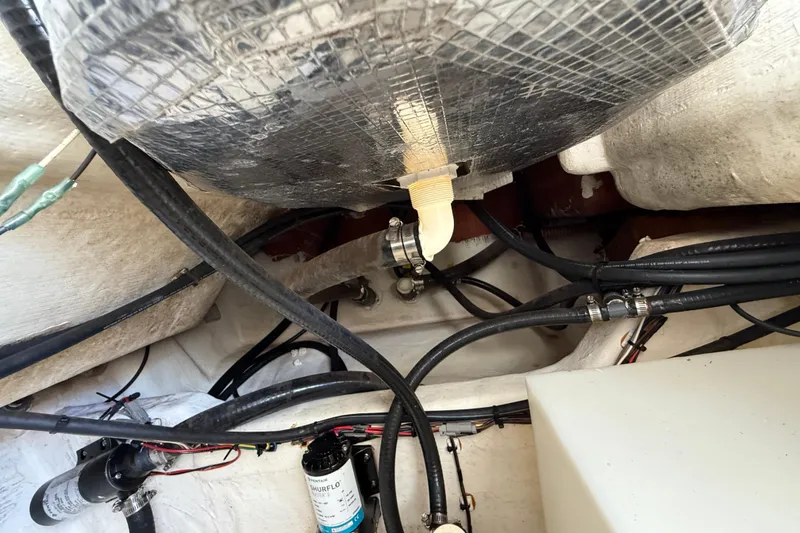 Slide: The Image of 2015 Cobia 296 Center Console boat wiring and plumbing details. - 11