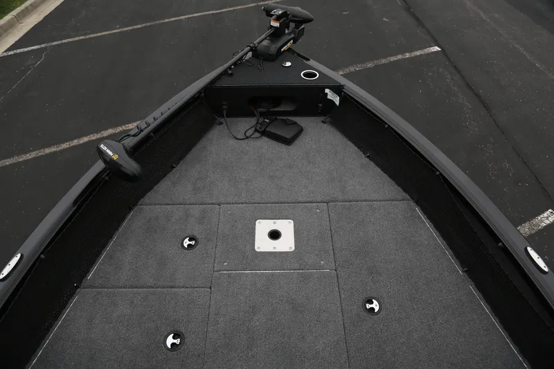 Slide: The Image of 2024 Ranger VS1682SC Angler boat deck with trolling motor and storage compartments. - 2
