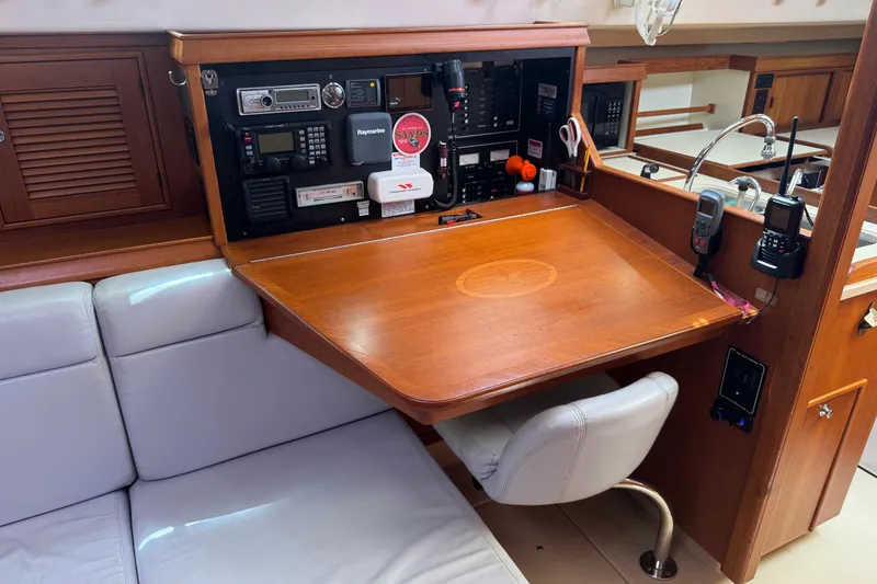 Slide: The Image of Navigation station on a 2004 Island Packet 420 yacht with communication equipment. - 18