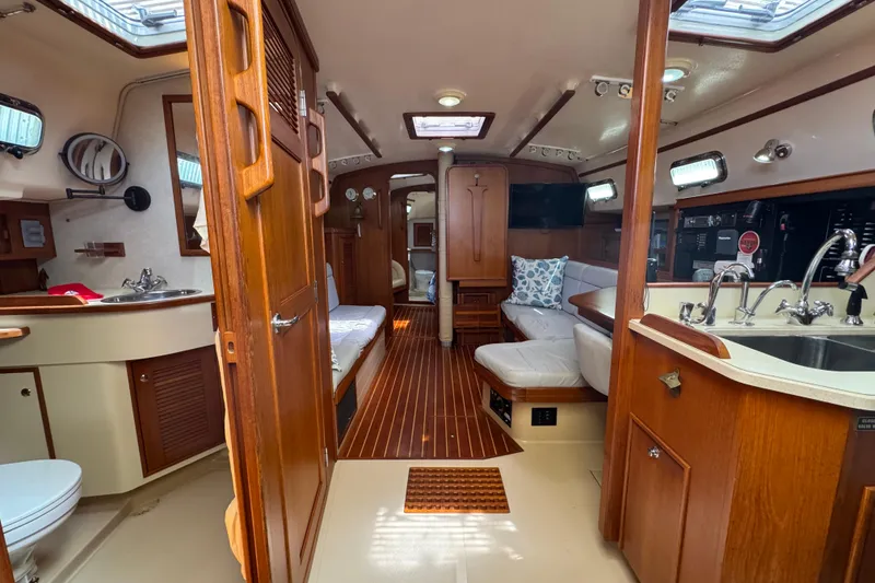 Slide: The Image of Interior of 2004 Island Packet 420 yacht with wood finishes and modern amenities. - 2