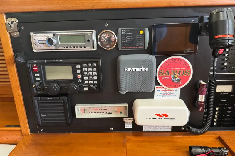 Slide: The Image of Control panel of a 2004 Island Packet 420 yacht with navigation and communication equipment. - 20