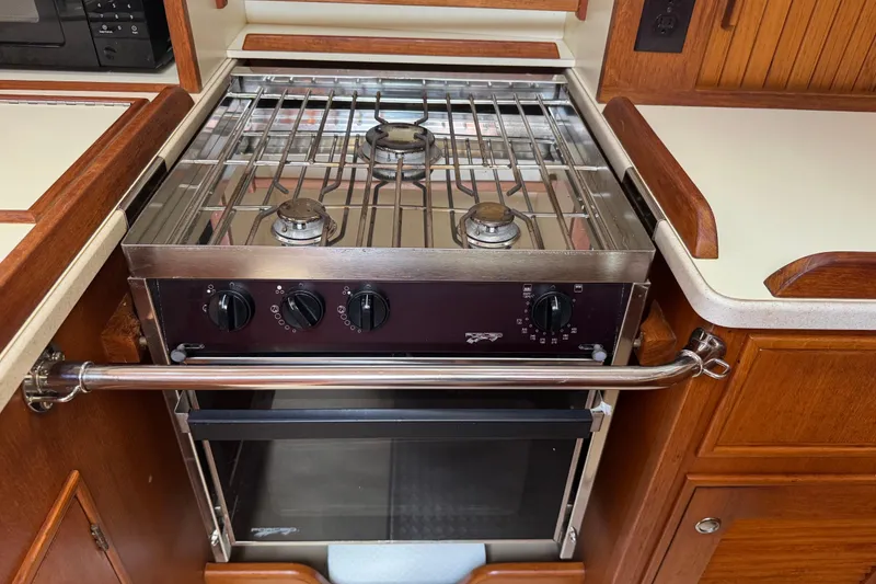Slide: The Image of Stainless steel stove in 2004 Island Packet 420 yacht kitchen. - 23