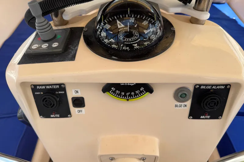 Slide: The Image of Control panel of a 2004 Island Packet 420 sailboat with compass and gauges. - 42