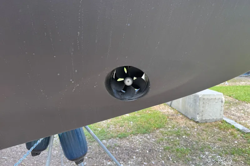 Slide: The Image of Bow thruster on 2004 Island Packet 420 sailboat hull, displayed on land. - 46
